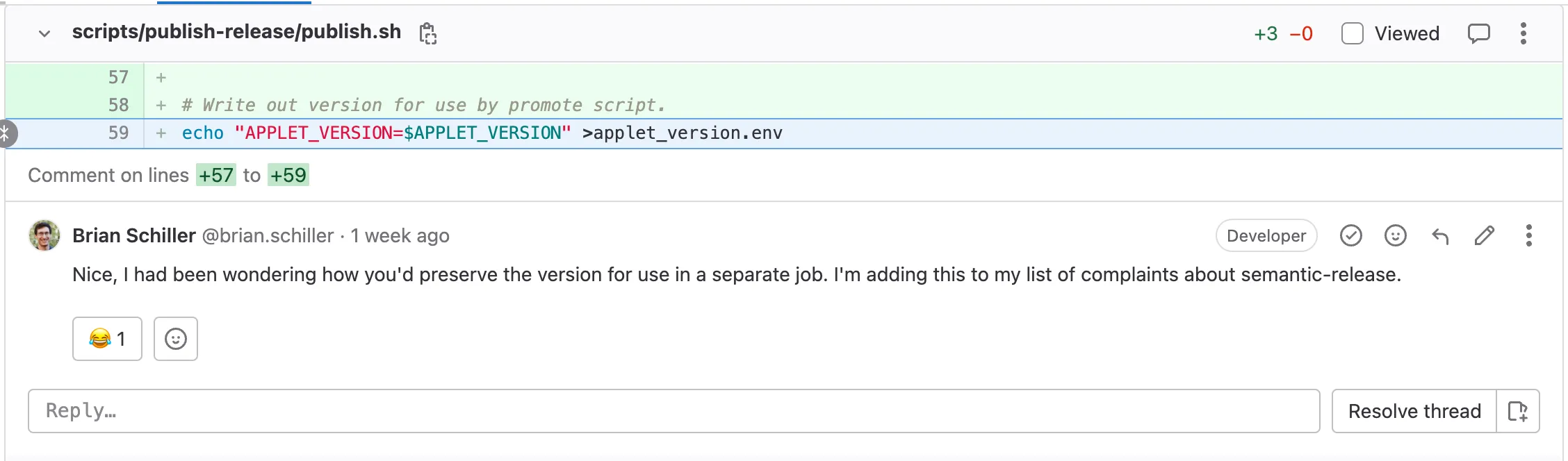 a code review comment complimenting Zach Hauser on coming up with a way to save the version between the "publish" and "promote" CI jobs. The code shows writing an environment variable to a file called applet_version.env.