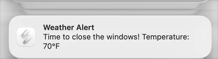 A macOS alert saying "Weather Alert: Time to close the windows! Temperature: 70°F"